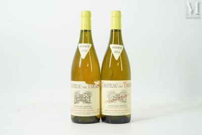 two bottles of wine sitting next to each other on a table