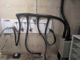 a bunch of wires that are connected to a wall