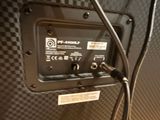 an image of a close up of a speaker in a room