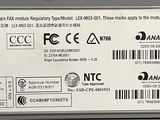 a label on the back of a machine that has a barcode on it