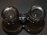 a pair of binoculars that are sitting on a table