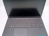 a laptop that has a keyboard on top of it
