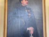 tableau représentant un homme vêtu d'une robe bleue et tenant une canne