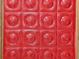 an image of a painting of a red box with a lot of bubbles in it