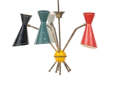 four different colored lamps hanging from the ceiling