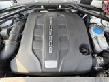 the engine of a car with the hood up and the hood down