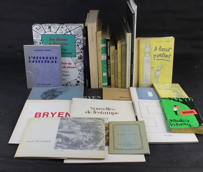 several books are stacked on top of each other on a table