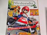 nintendo magazine with mario kart and mario kart on the cover