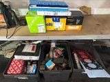 many boxes of assorted items sitting on a shelf