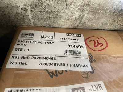 a box that is sitting on the ground with a price tag on it