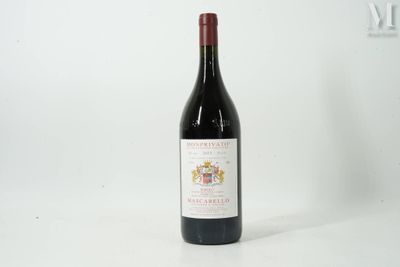 a bottle of wine that is sitting on a table