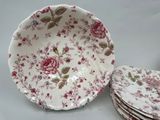 a stack of plates that are sitting on a table