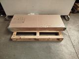 a large box sitting on a pallet in a warehouse