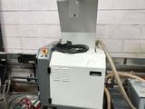 a machine that is sitting on a table in a room