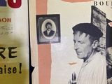 an old newspaper with a picture of a man on it