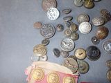 a lot of coins and a purse on the table