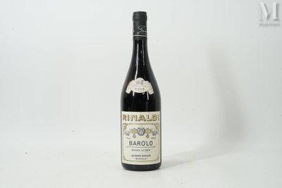 a bottle of wine that is sitting on a table