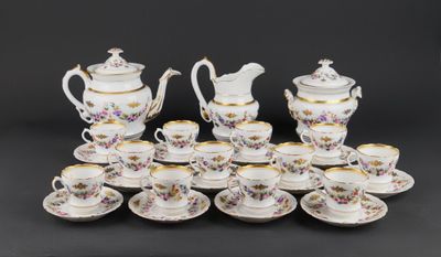 a group of porcelain tea and coffee cups and saucers