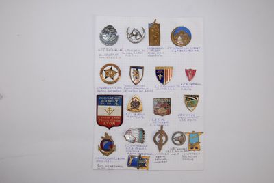 a picture of a wall with a bunch of badges on it