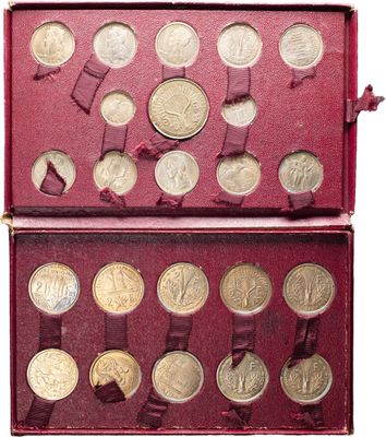 a red box with a bunch of coins in it