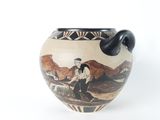 a vase with a painting of a man on it