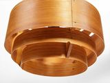 a wooden light fixture hanging from the ceiling