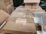 many boxes that are sitting on a table in a warehouse