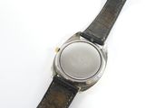 an image of a close up of a wrist watch on a white surface