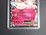 a pokemon card in a plastic container on a table