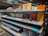 a lot of books on the shelves in the store