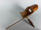 an image of a wooden object with a wooden handle and a wooden handle