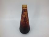 a vase that has a picture of a woman on it