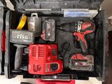 a tool box with tools in it on a table