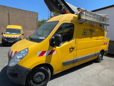 a yellow truck with a ladder on the back of it