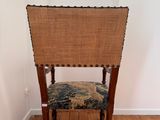 a chair that is sitting in the corner of a room