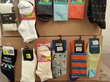 many pairs of socks that are on a pallet