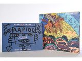 deux livres posés sur une table, avec le dessin d'un homme à cheval