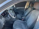 the interior of a car with a steering wheel and a dashboard