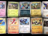 a lot of different pokemon cards on the table