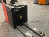 a forklift with two forks on it in a warehouse