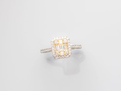 a diamond and white gold ring
