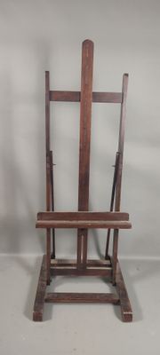 an old wooden easer with a wooden seat on a white background