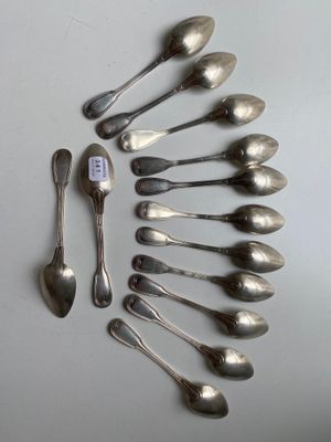 a lot of spoons and spoon spoons on the table