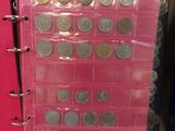 a pink bind with a bunch of coins in it