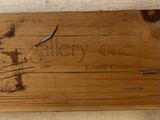 a wooden sign that says gallery one on it