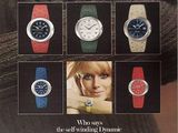 an advertisement for omega watches featuring a woman in a sweater and a man in a sweater