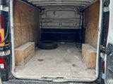 the back of a van with the door open and the back door open