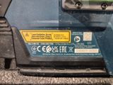 a close up of a blue and yellow machine