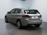 a silver car that is parked inside of a building