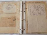 an open book with writing on it on a table